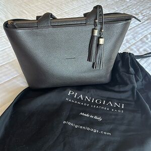 Chocolate brown pebbled leather bag from Italy in a like new condition